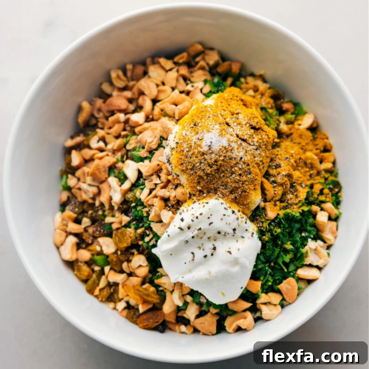 Curry Chicken Salad ingredients in a bowl