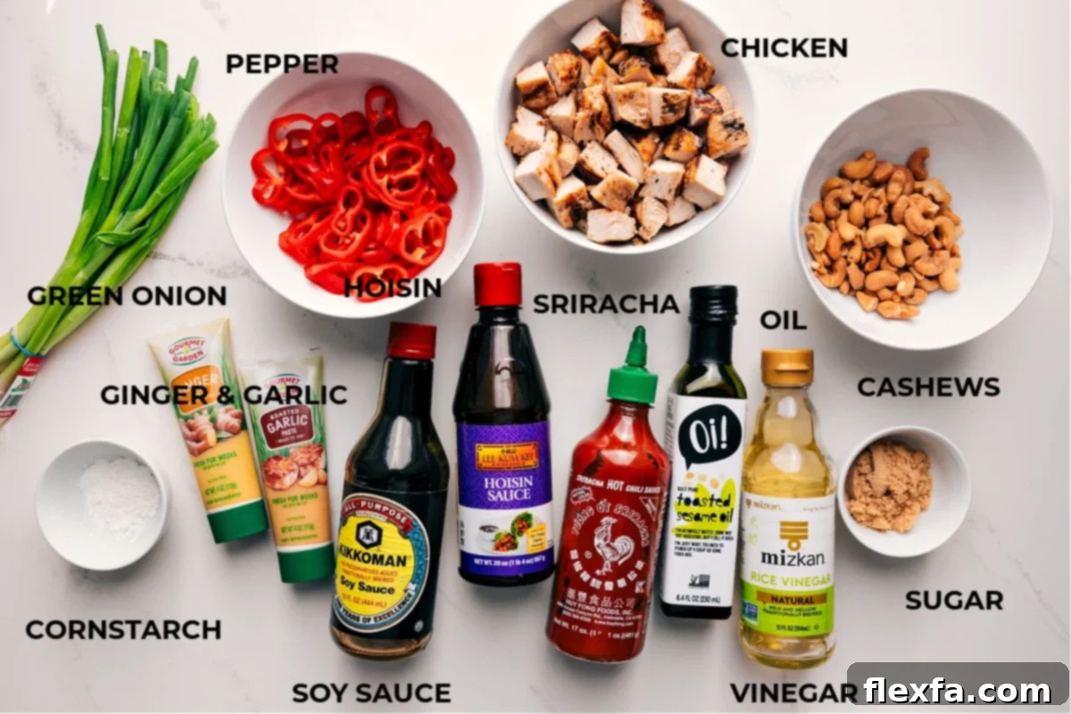 Ingredients for Cashew Chicken including chicken, peppers, cashews, and sauce ingredients.