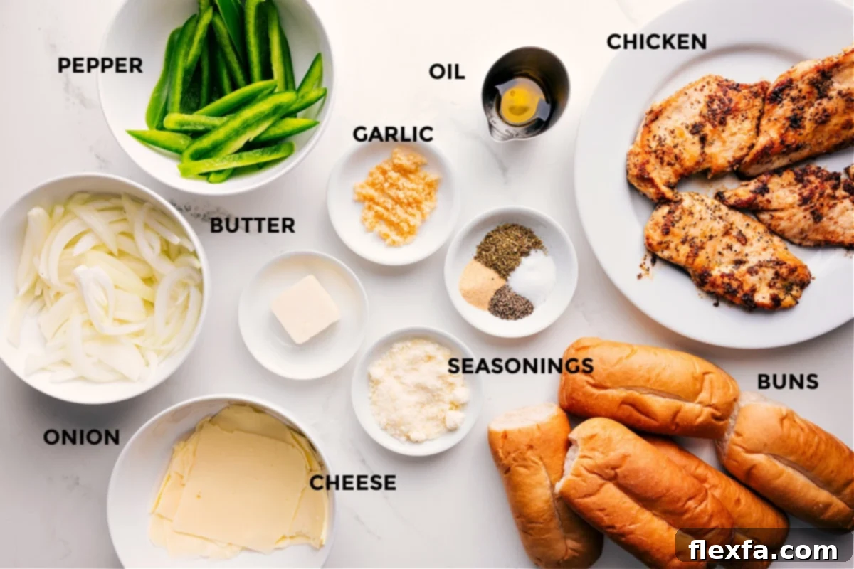 All the ingredients in this recipe prepped out for easy assembly including the onions, cheese, peppers, butter, seasonings, garlic, oil, buns, and chicken.