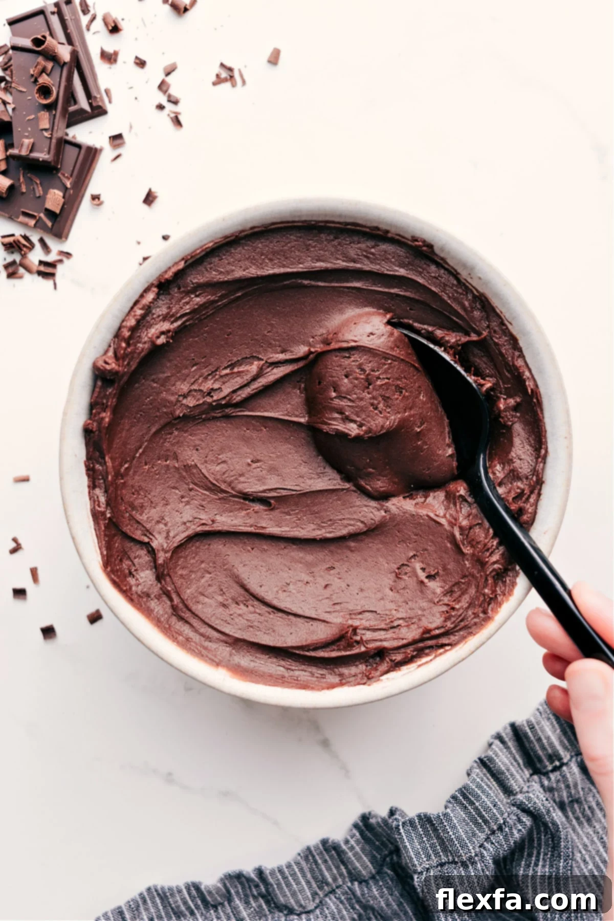 Chocolate Buttercream Frosting Recipe in a bowl, ready to be devoured.