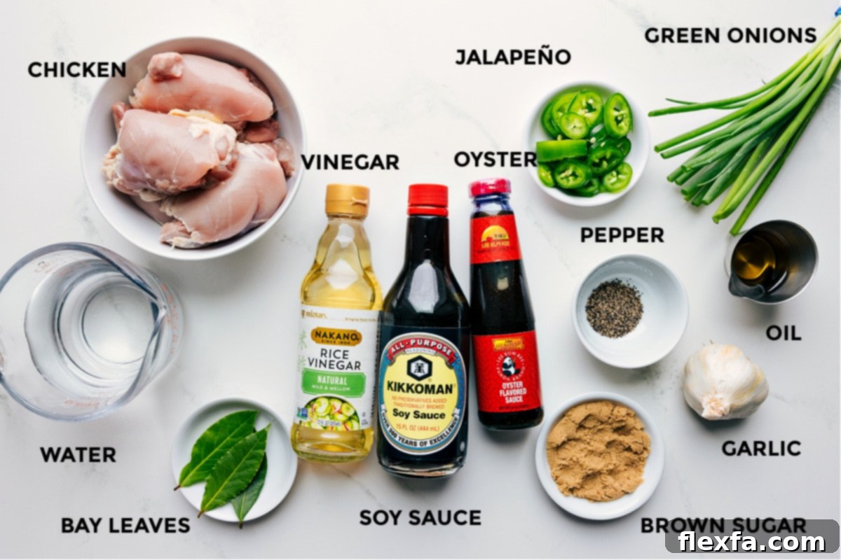 Ingredients for Chicken Adobo, including chicken, bay leaves, vinegar, soy sauce, garlic, and more.
