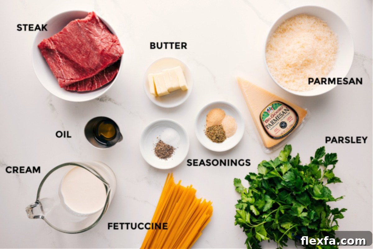 Ingredients for Steak Alfredo Recipe, including steak, fettuccine, cream, and Parmesan.