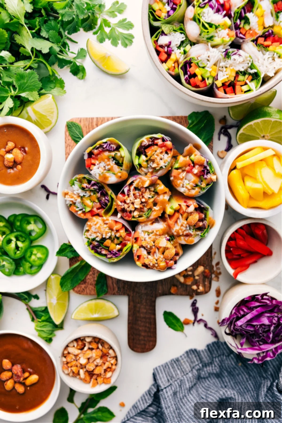 Homemade spring rolls with fresh ingredients and peanut dipping sauce