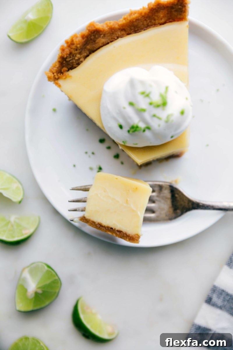 A delicious sweet and tangy slice of dessert with a bite taken out of it.