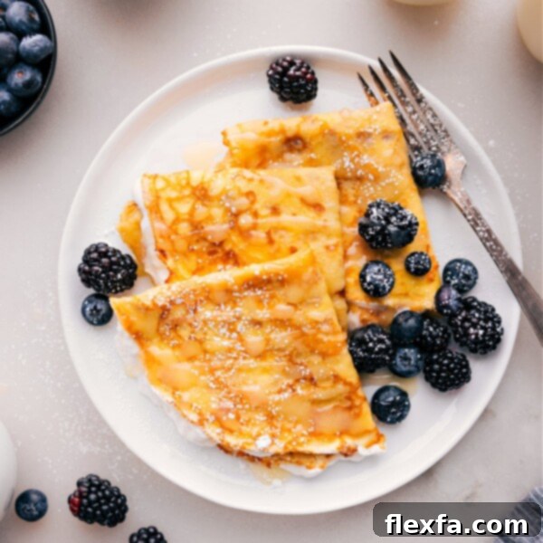 Plateful of delicious crepes ready to be enjoyed.