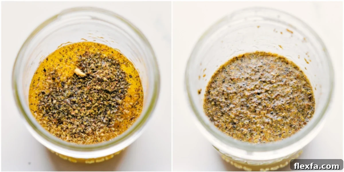 The lemon garlic dressing for Greek Potatoes Recipe being vigorously shaken in a mason jar to combine.