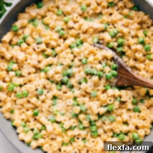 A close-up of the delicious creamy pasta with peas recipe.