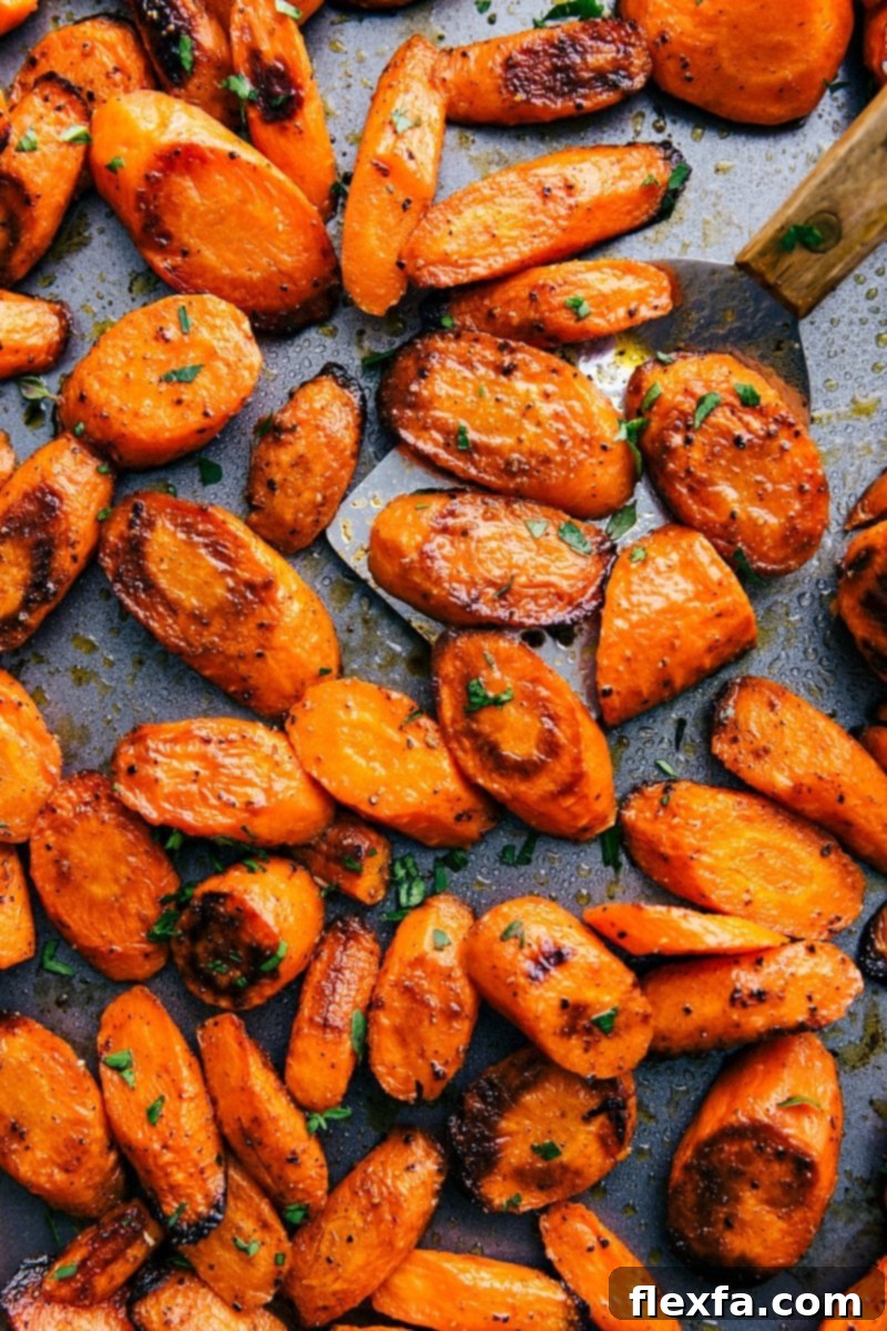 Tray of perfectly roasted carrots, ready to be served.