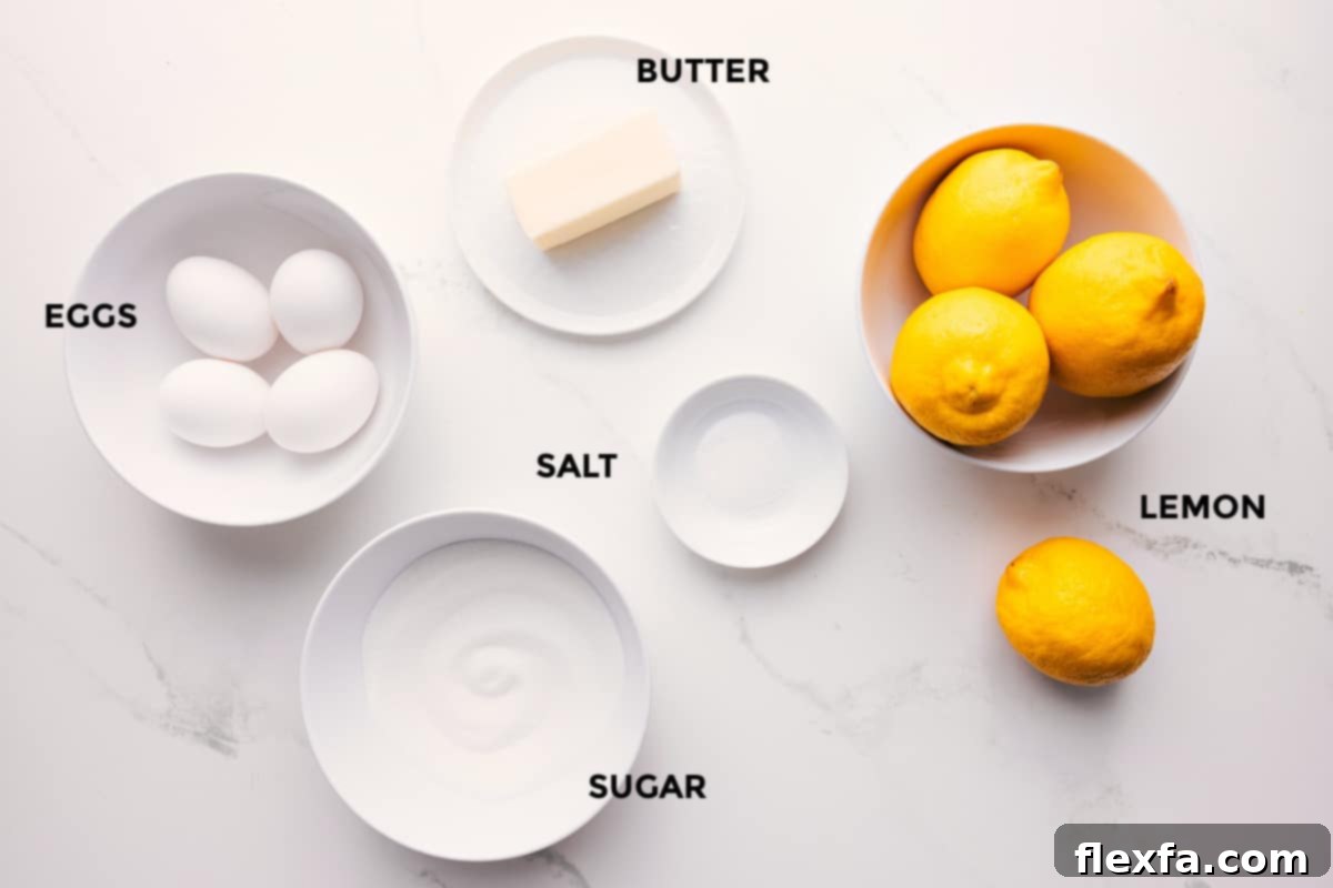 All the essential ingredients for making this homemade Lemon Curd recipe, including fresh lemons, eggs, butter, sugar, and a pinch of salt, neatly arranged and ready for preparation.