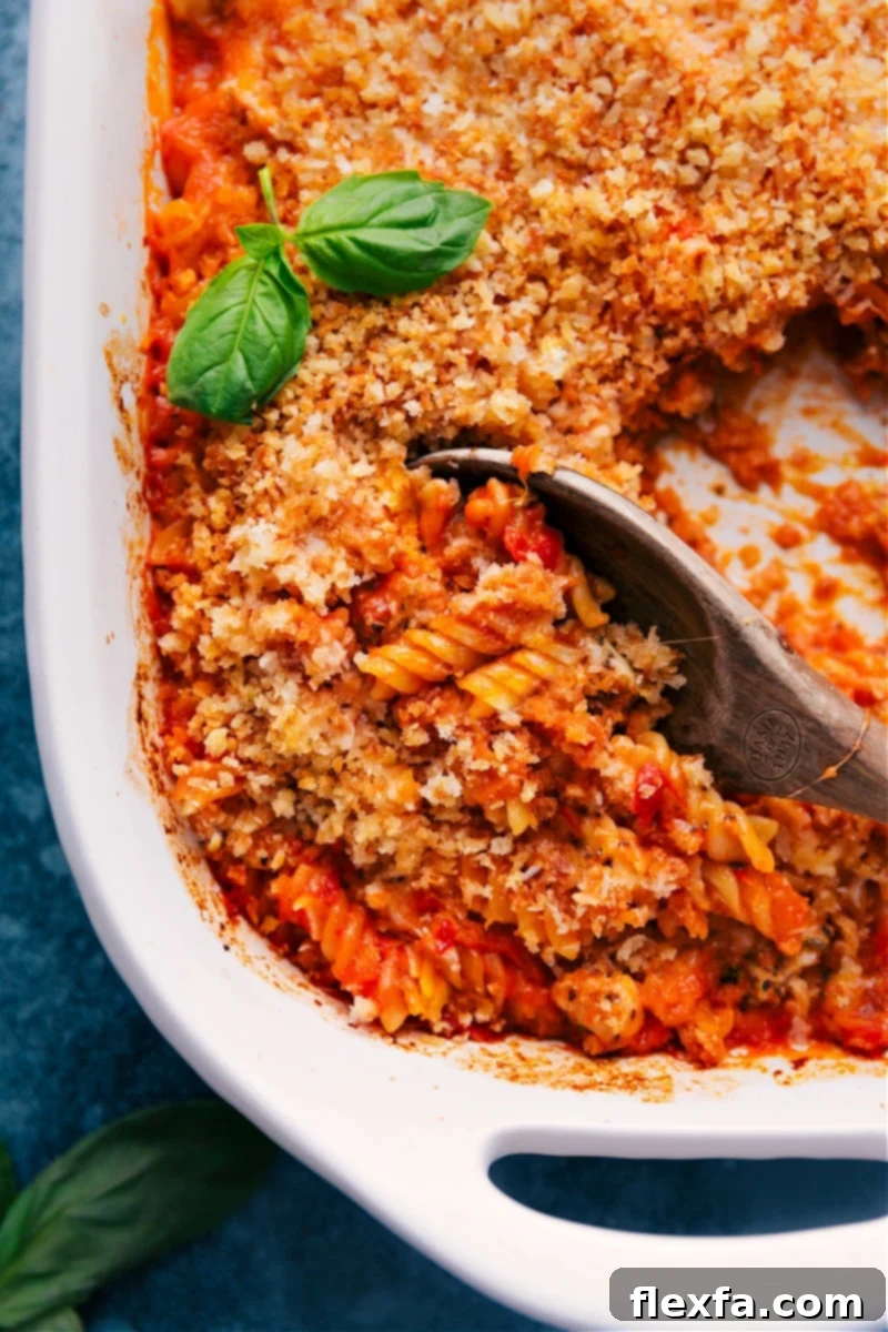 One-pan chicken parmesan pasta, cheesy and baked to perfection with uncooked pasta and chicken.