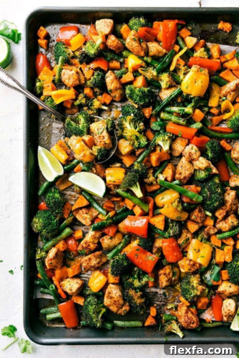 A hearty one-pan healthy chicken and vegetables dinner, packed with juicy chicken, soft veggies, and cheesy flavor.