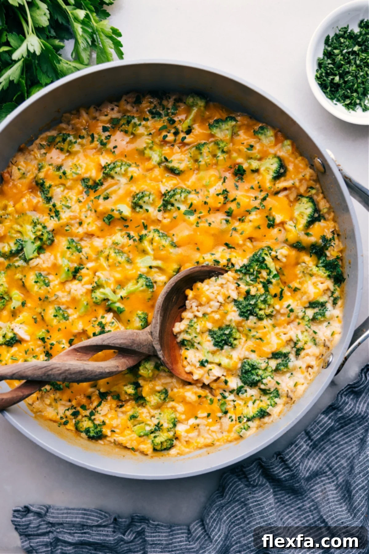 A freshly made, one-skillet creamy chicken broccoli rice casserole, ready to be enjoyed.