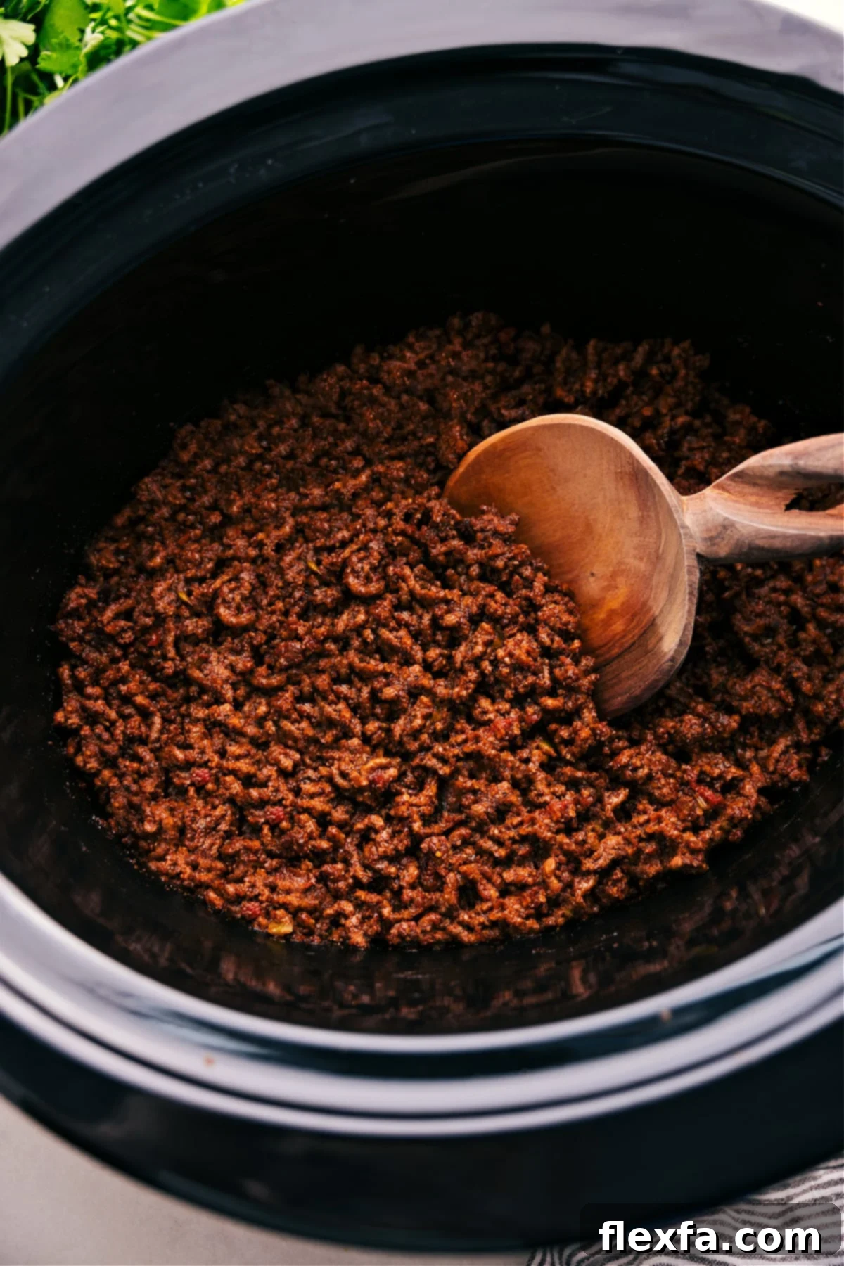 Healthy ground beef recipes: Flavorful Crockpot Taco Meat simmering in a slow cooker, perfect for make-ahead meals.