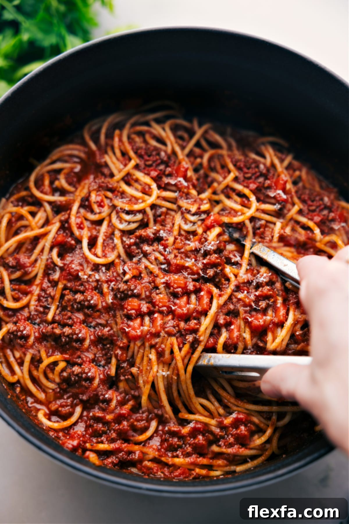 A simmering pot of rich and hearty Spaghetti Bolognese sauce, ready for pasta.