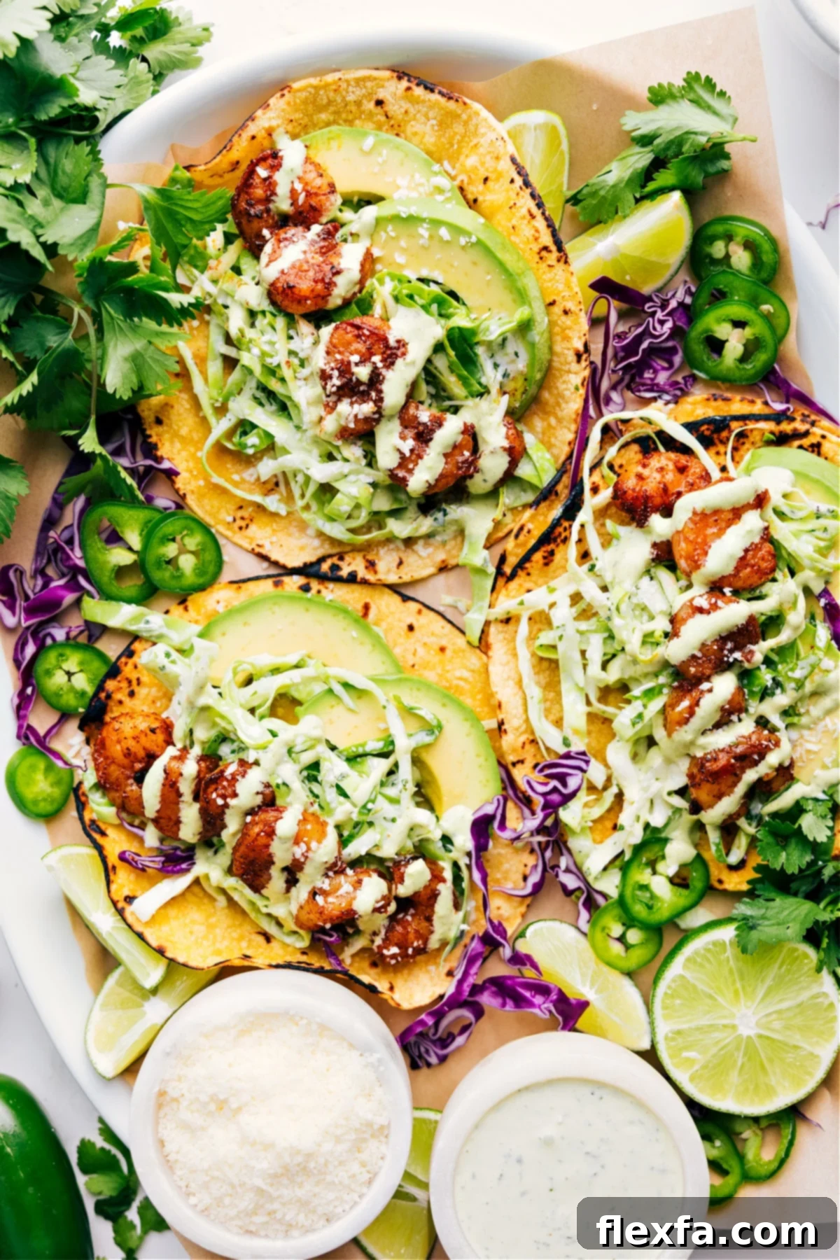 Vibrant shrimp tacos, loaded with seasoned shrimp, crisp slaw, and creamy avocado, ready to enjoy.