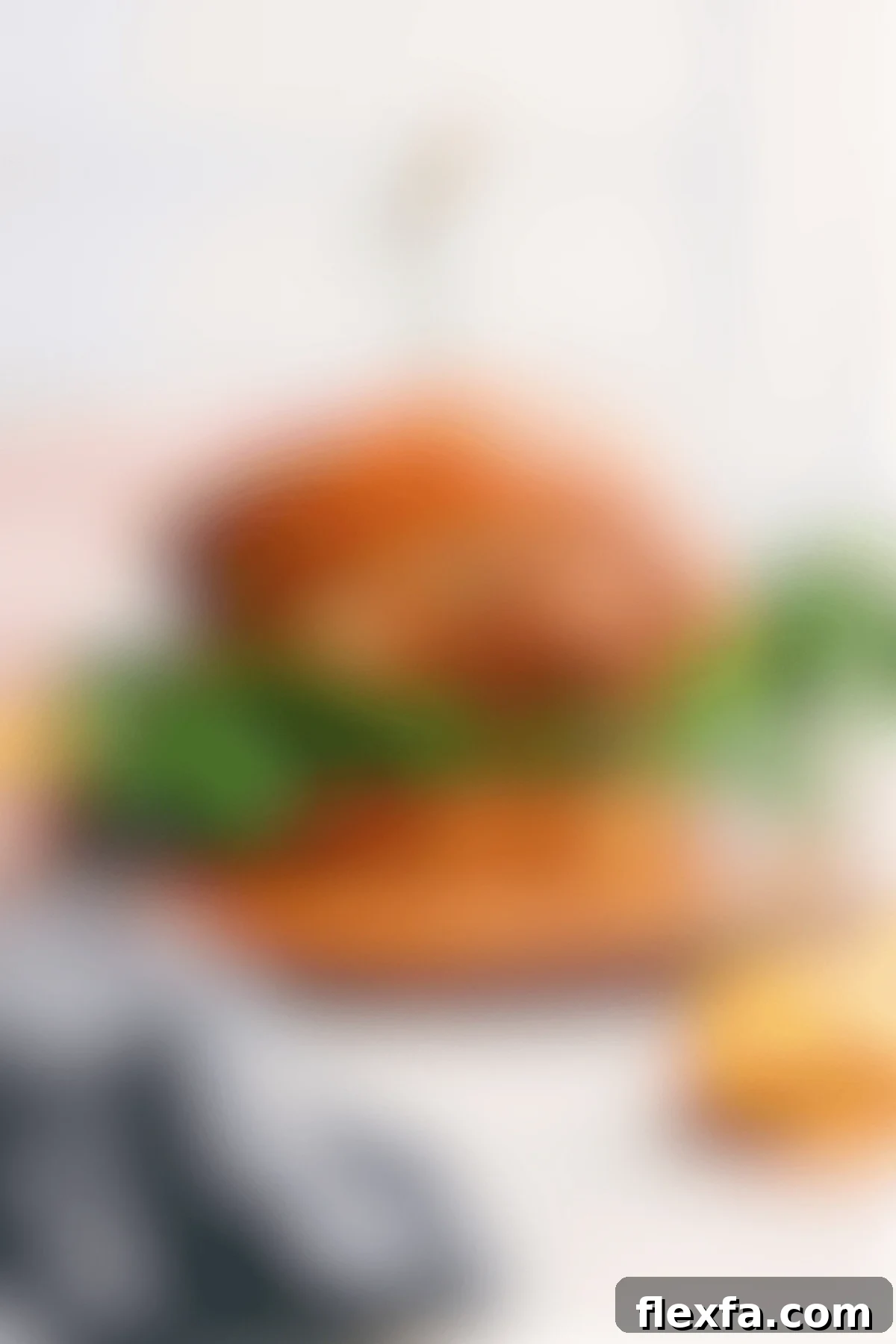 A delicious homemade Copycat Chick-Fil-A Chicken Sandwich, perfectly cooked and ready to serve on a soft bun with pickles.