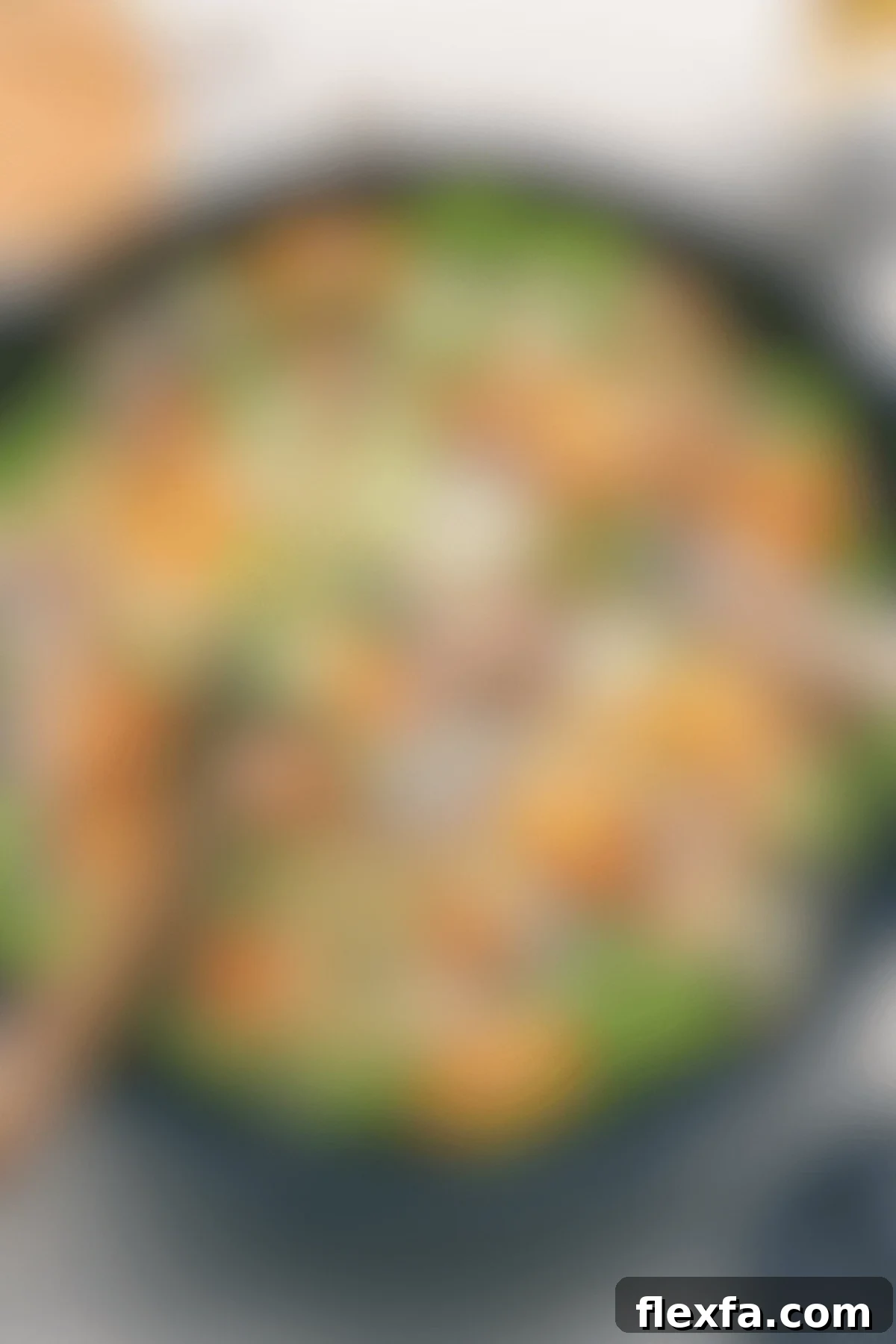 A vibrant Applebee's chicken salad copycat recipe, generously tossed with dressing in a large bowl, ready to be served and savored.