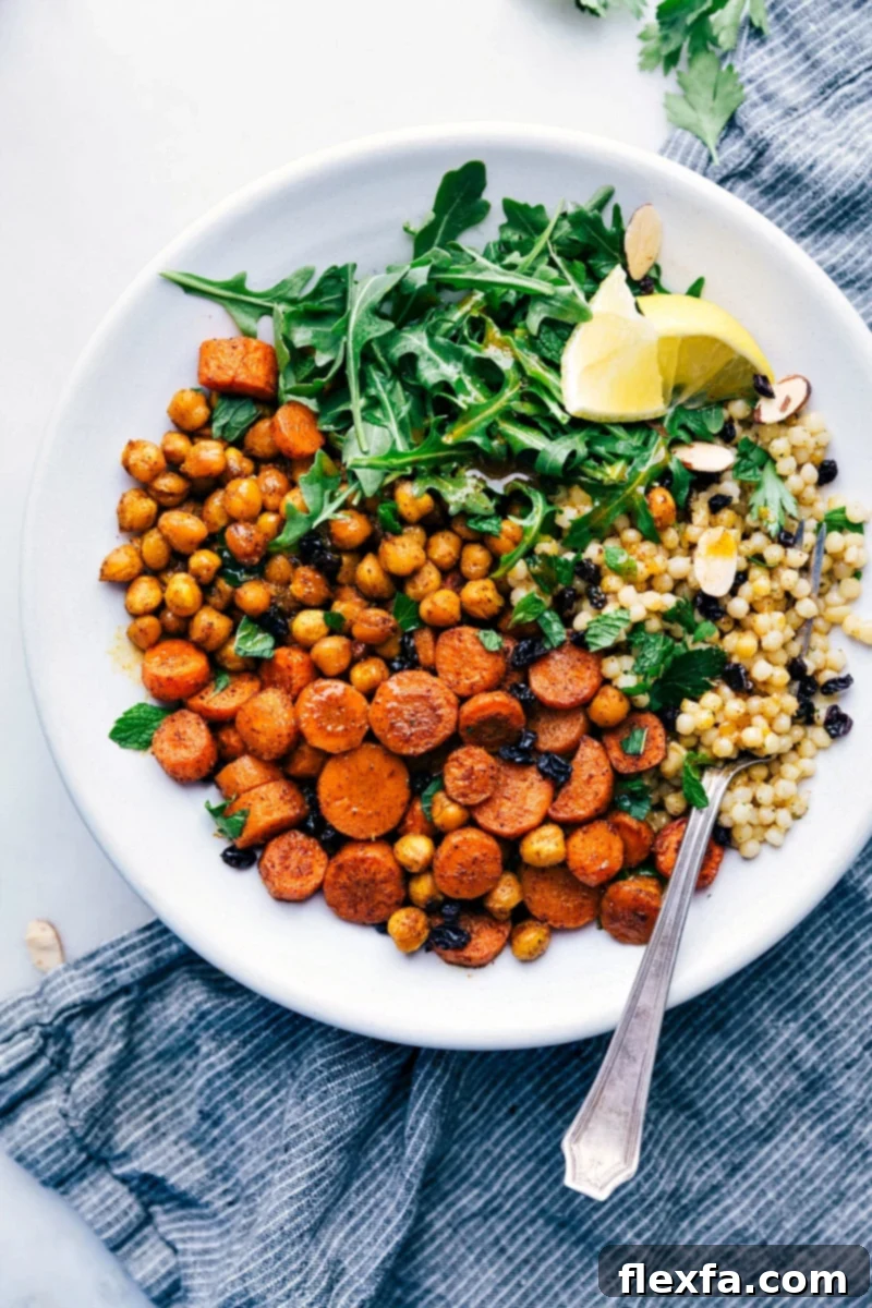 A vibrant Moroccan carrot salad with chickpeas and fresh arugula, showcasing exotic flavors and textures.