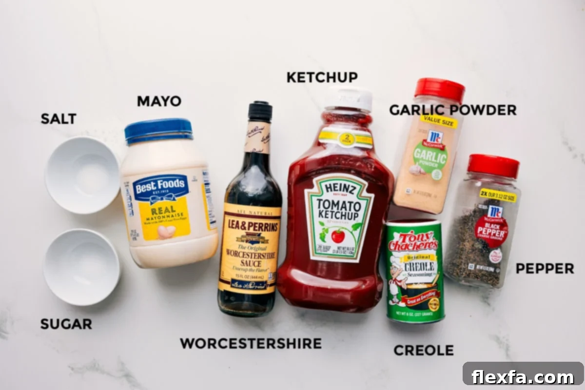 The ingredients for the Cane's sauce recipe displayed on a countertop, including mayonnaise, ketchup, Worcestershire sauce, and spices.