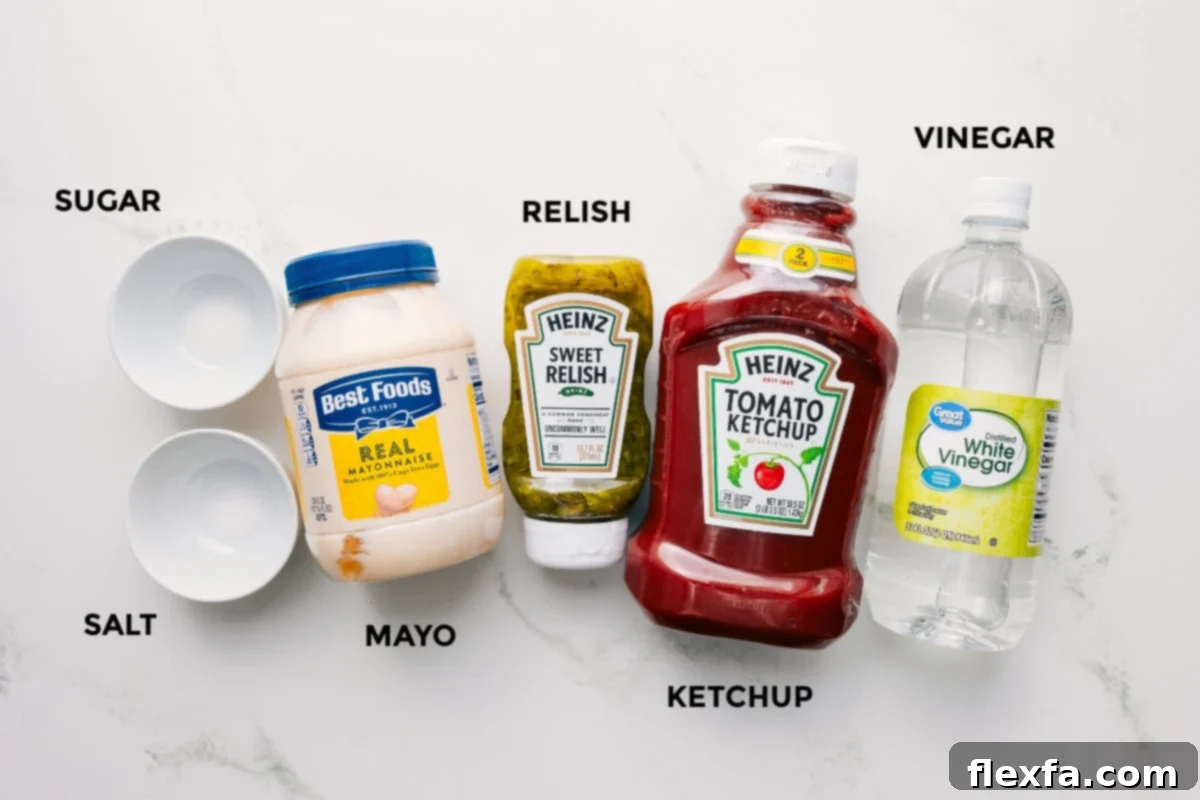 Ingredients for the copycat sauce, including mayonnaise, ketchup, sweet pickle relish, vinegar, sugar, and salt, laid out on a countertop.