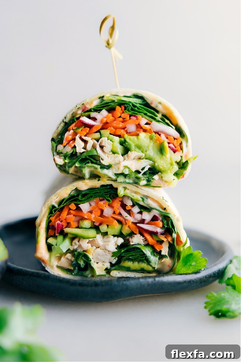 Thai chicken wraps stacked on top of each other.
