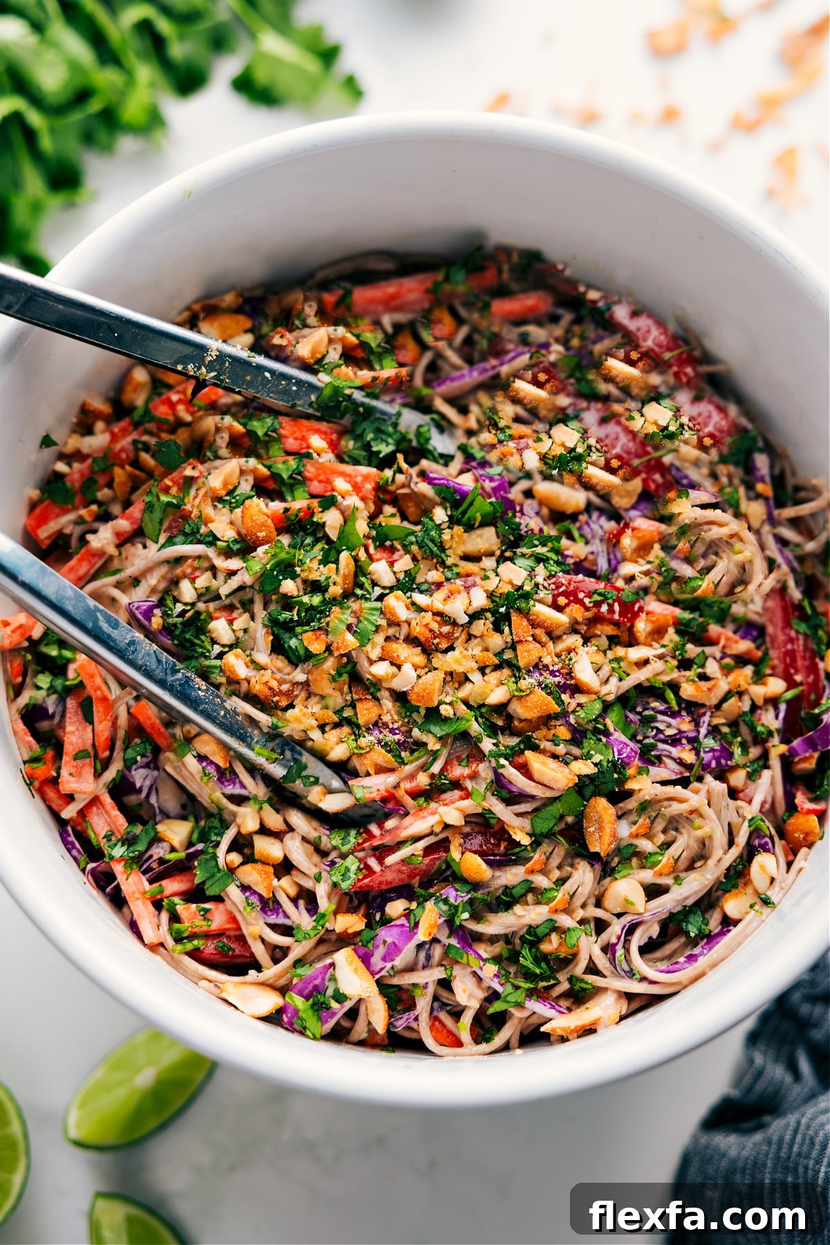 Asian chicken recipes: Soba noodle recipe in a bowl tossed together in a large bowl.