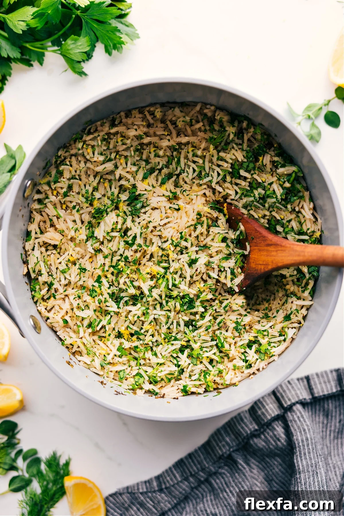 Greek rice in the pot filled with fresh herbs.