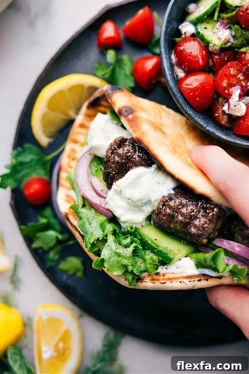 Greek meatballs tucked into warm pita bread and topped with creamy tzatziki sauce.