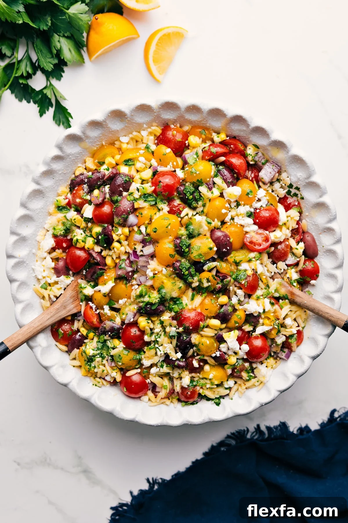 Greek orzo pasta salad in a bowl.