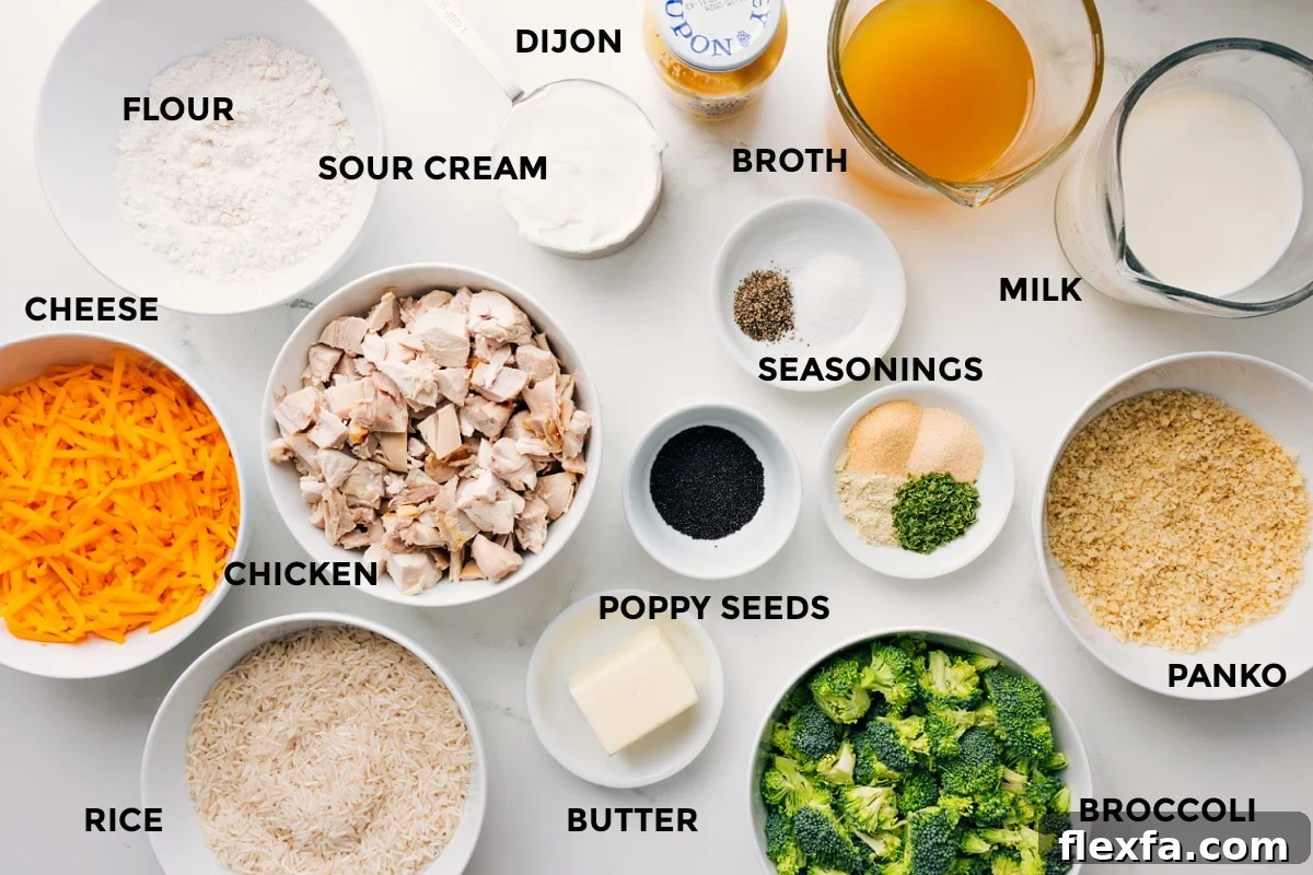 Ingredients for Poppy Seed Chicken Casserole prepped for assembly, including cheese, rice, chicken, broccoli, panko, and sauce ingredients.