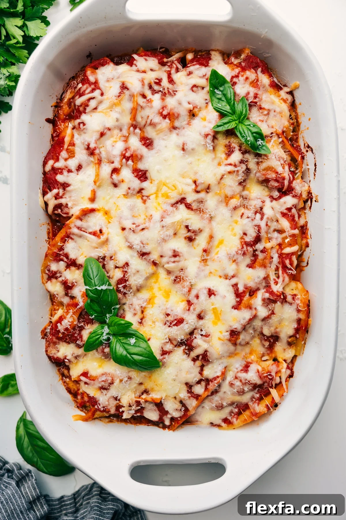 Stuffed shells baked with marinara, cheese filling, sausage, and melted cheese.
