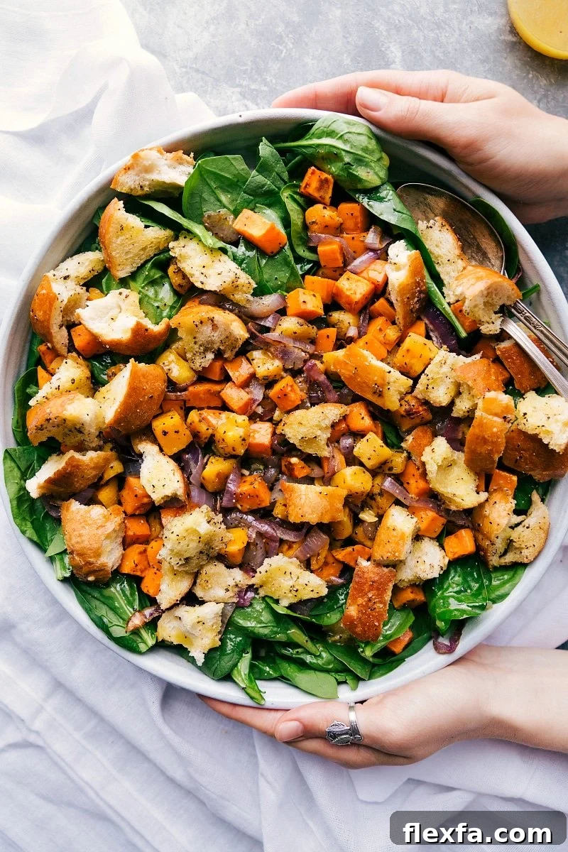Roasted veggie salad in a giant bowl, delicious and filling, ready to be served.
