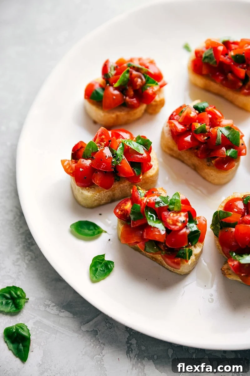 Fresh bruschetta with tomatoes, basil, garlic, and toasted bread.