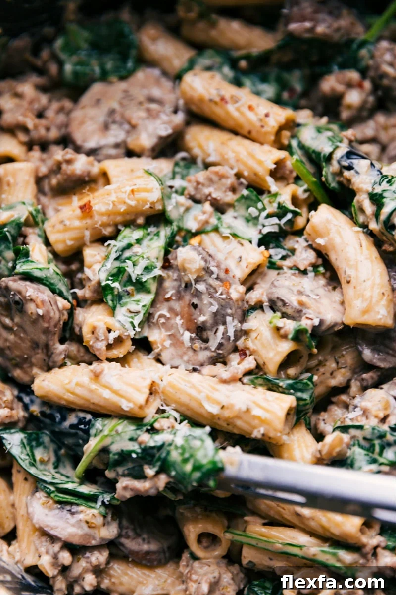 Creamy rigatoni with sausage, mushrooms, and a rich sauce.