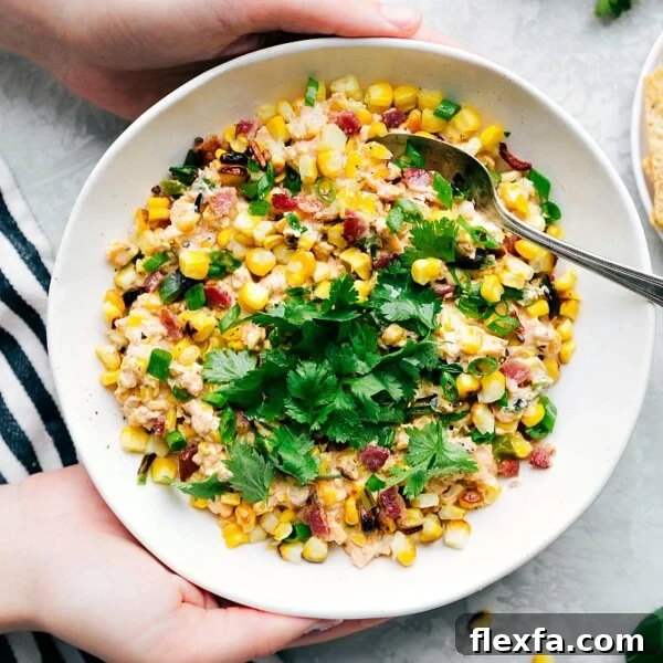 Creamy corn salad, rich and packed full of flavor, ready to be enjoyed as a delightful side dish.