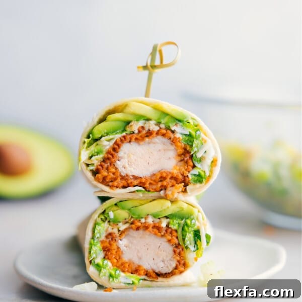 Chicken Caesar Wrap cut in half showing the insides of one of the wraps.