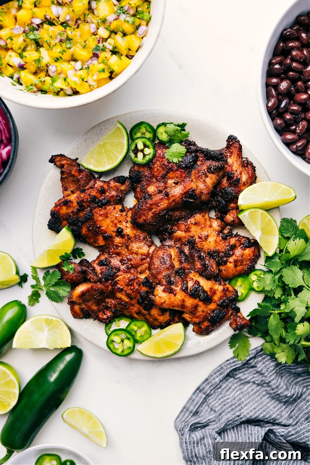 Caribbean-inspired jerk chicken with juicy meat and charred edges.