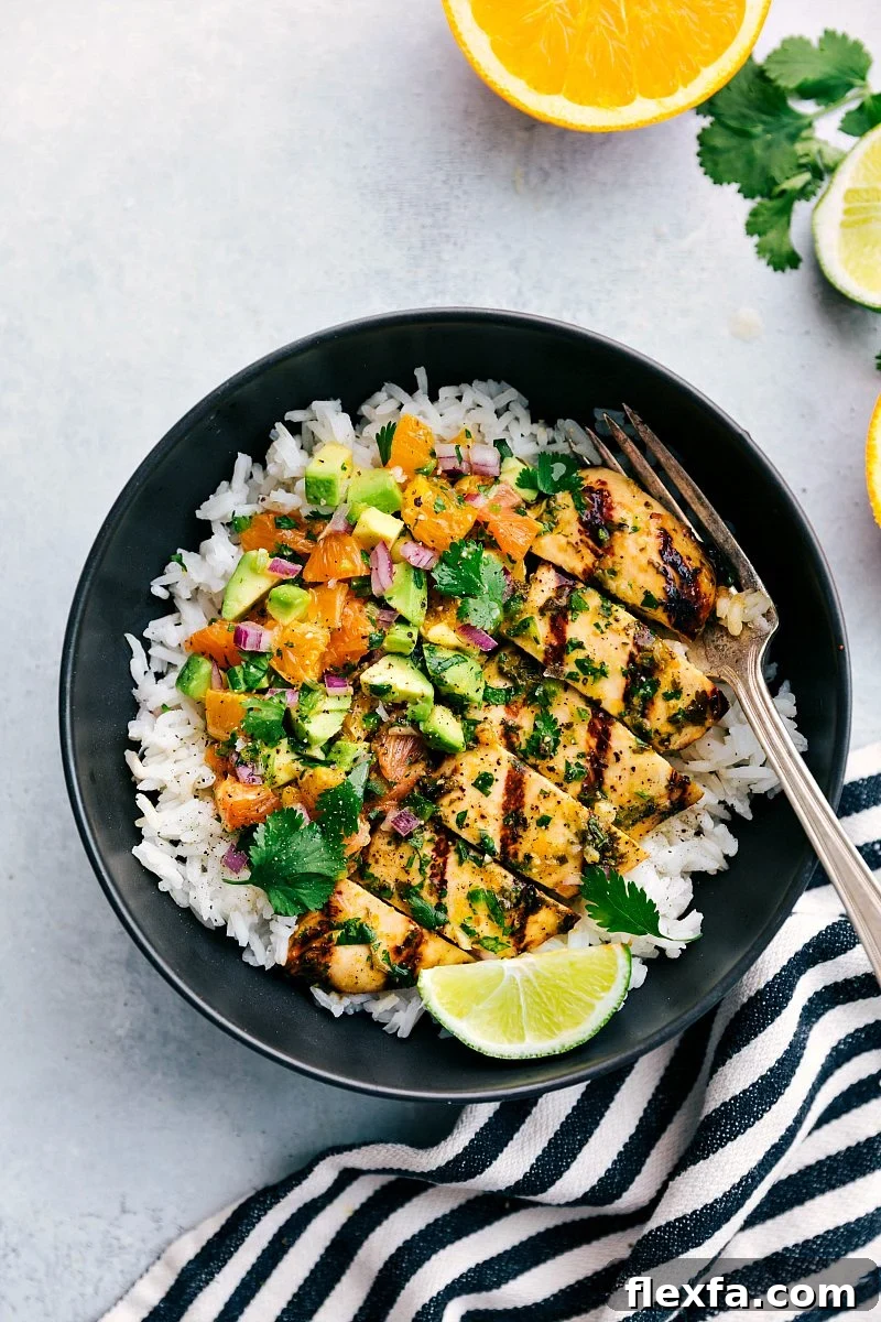 Cuban mojo chicken over rice with citrus avocado salsa.