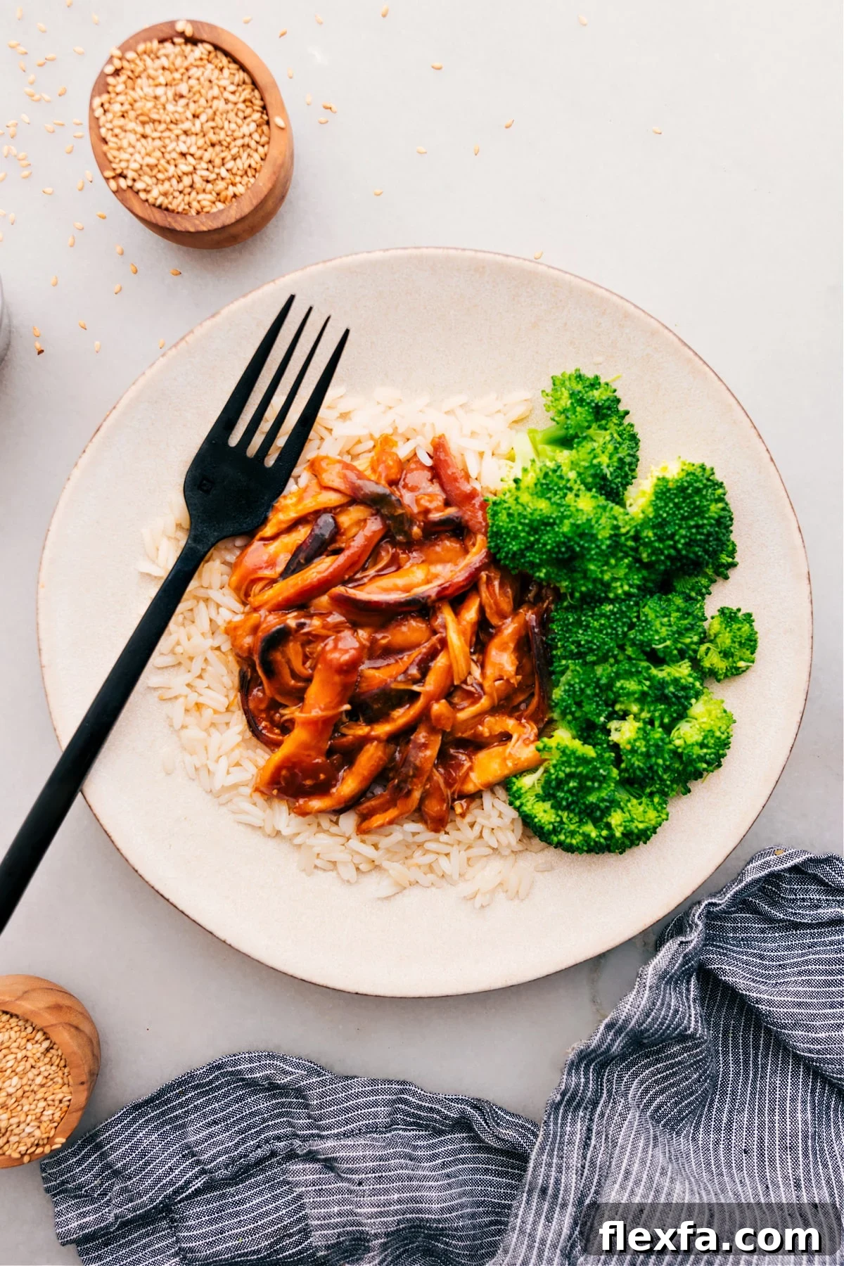 Tender chicken thighs coated in a sticky homemade honey garlic sauce.
