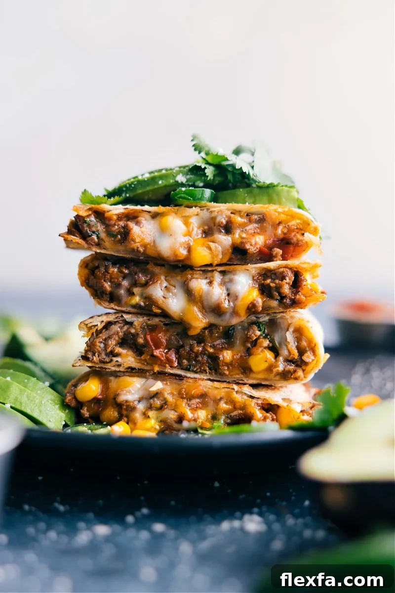 Crispy quesadillas filled with seasoned ground beef, corn, bell pepper, and melted cheese.