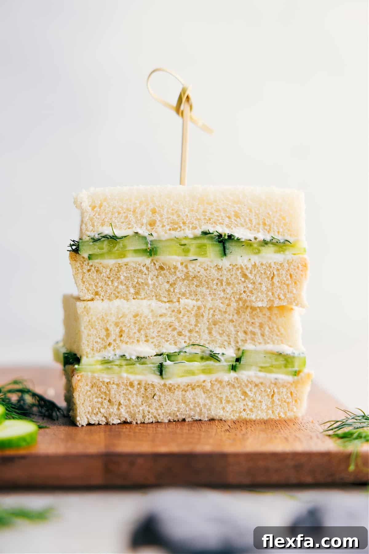 Cucumber sandwich recipes with seasoned cream cheese and thinly sliced cucumbers.
