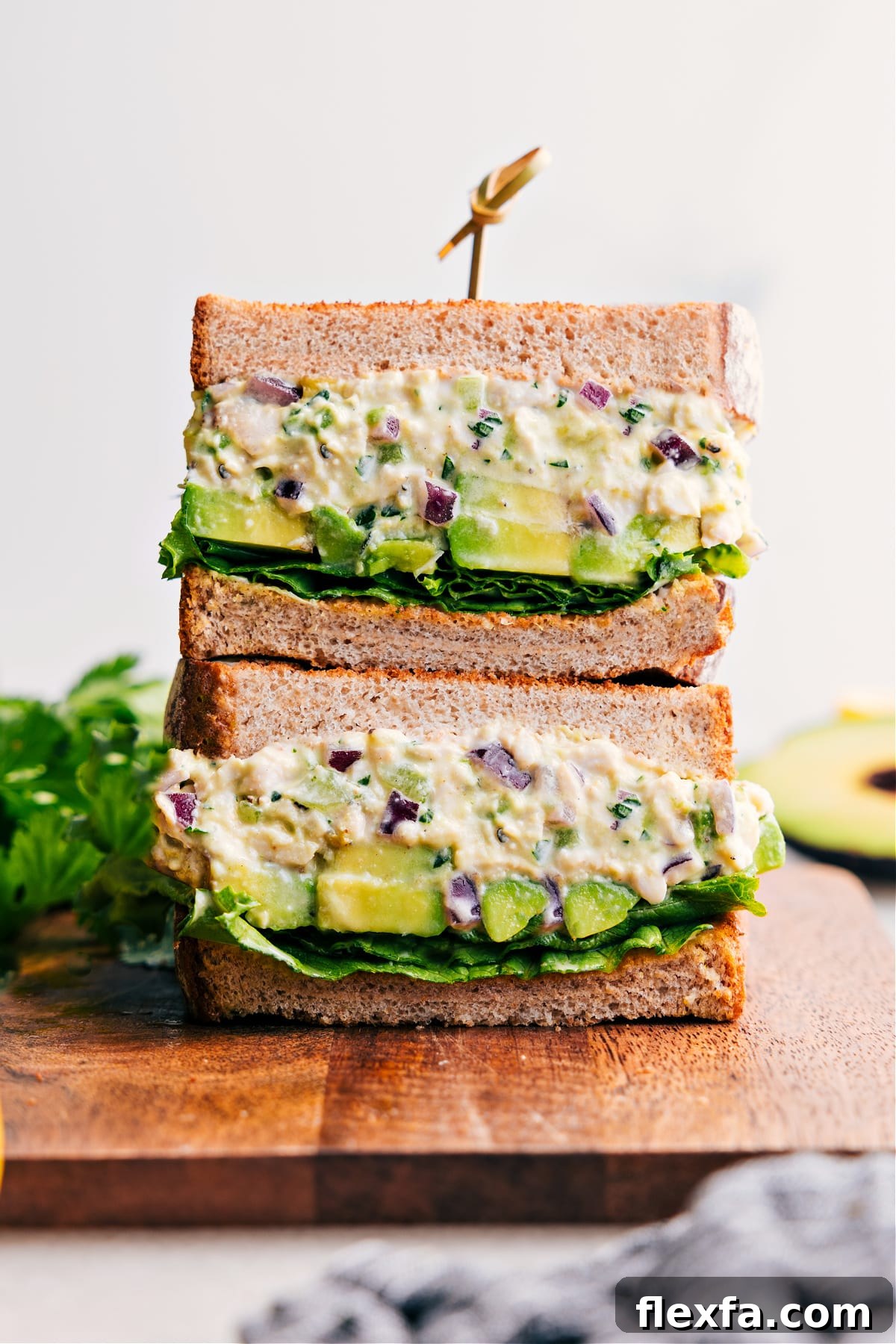 Chicken avocado sandwich with tender chicken, creamy avocado, and fresh toppings.