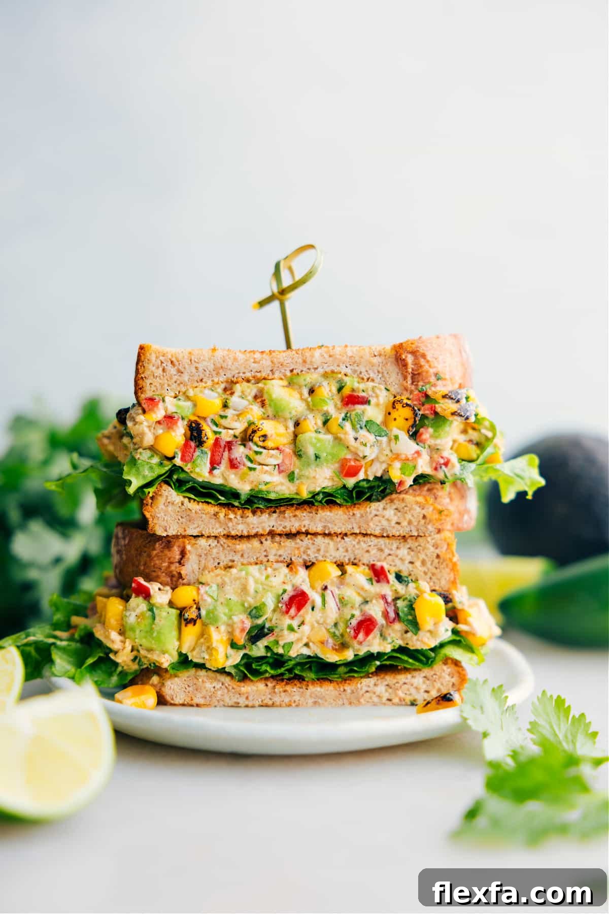Mexican street corn chicken salad with smoky corn, chicken, avocado, and creamy dressing.