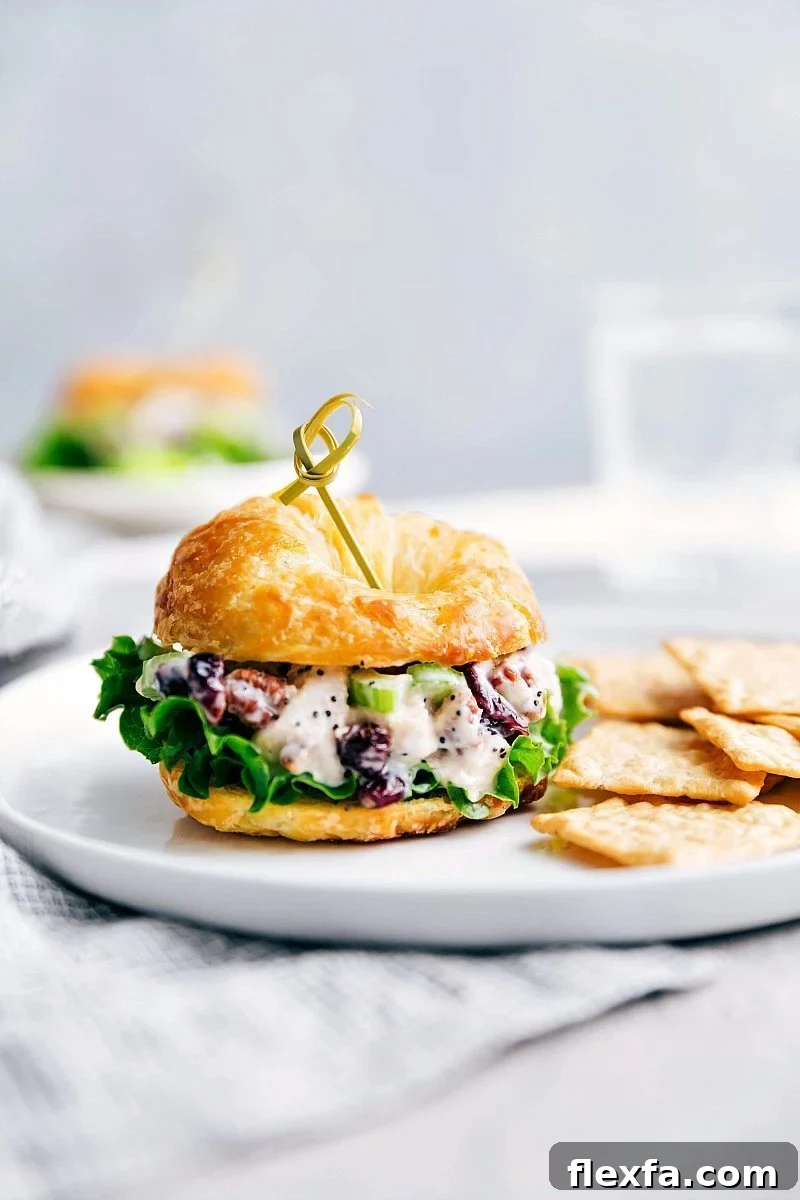 Chicken salad with creamy chicken salad piled generously between slices of bread.