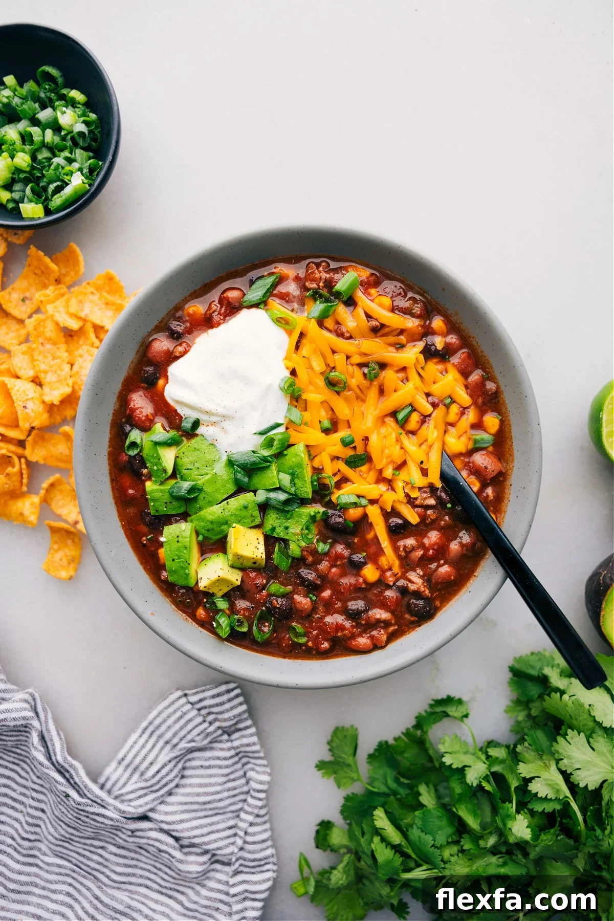 Taco soup with seasoned beef, corn, beans, and smoky chiles, one of the easiest healthy soup recipes.