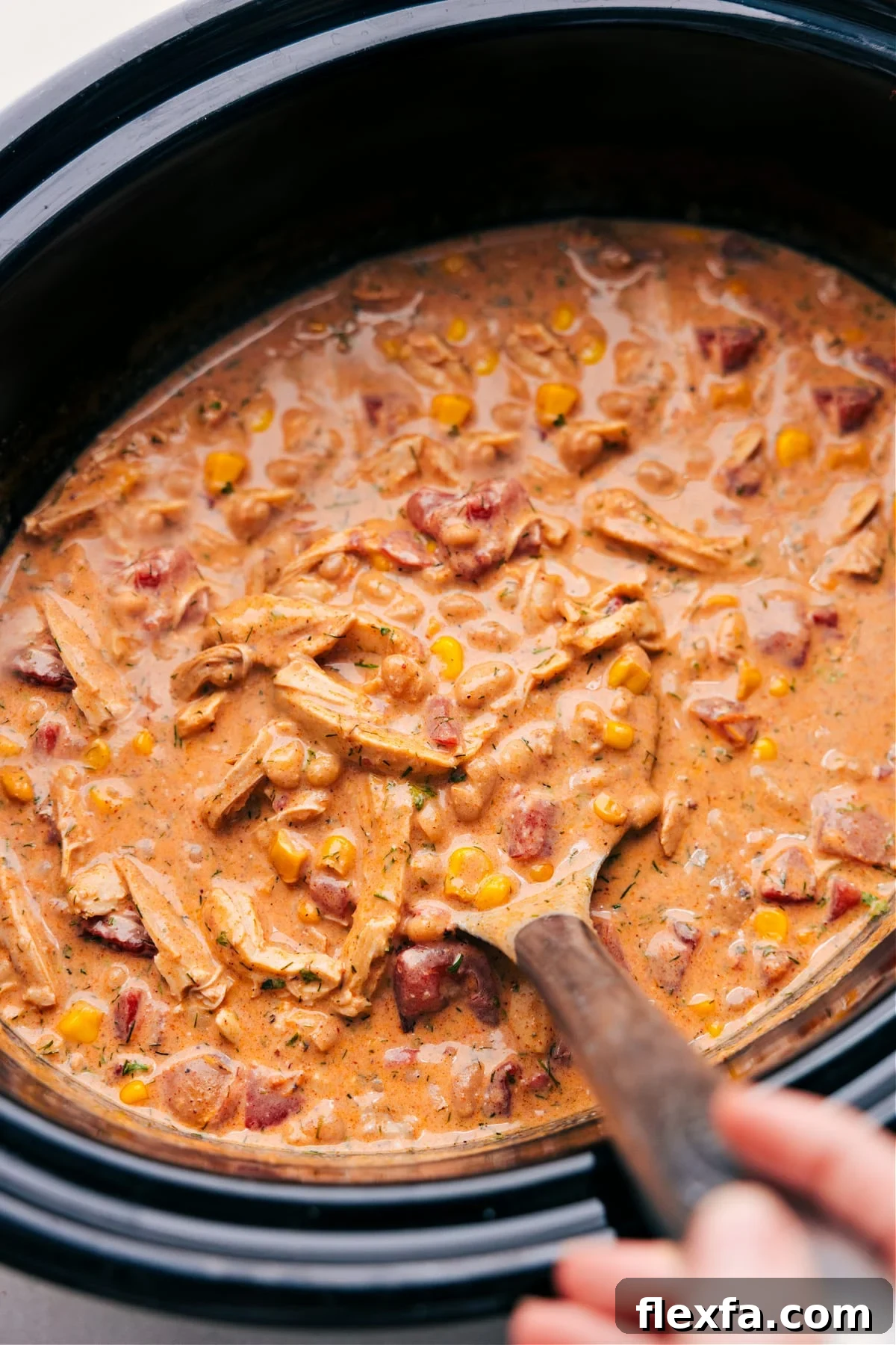 Easy crockpot meals featuring creamy Buffalo Chicken Chili with shredded chicken and flavorful toppings.