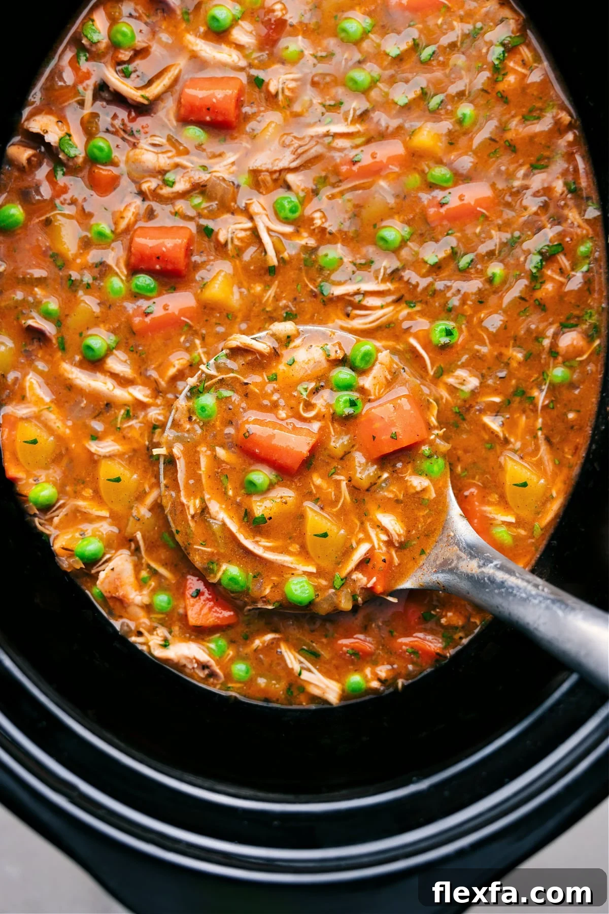 Hearty Crockpot Chicken Stew with tender chicken, vegetables, and a rich, savory broth.