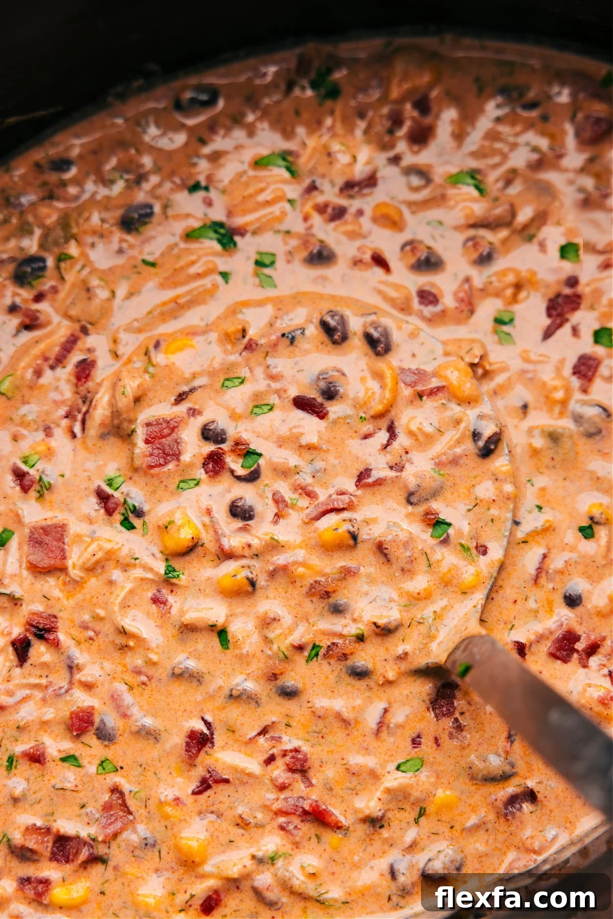 Easy crockpot meals featuring creamy Crack Chicken Chili with shredded chicken, bacon, ranch, and cheese.