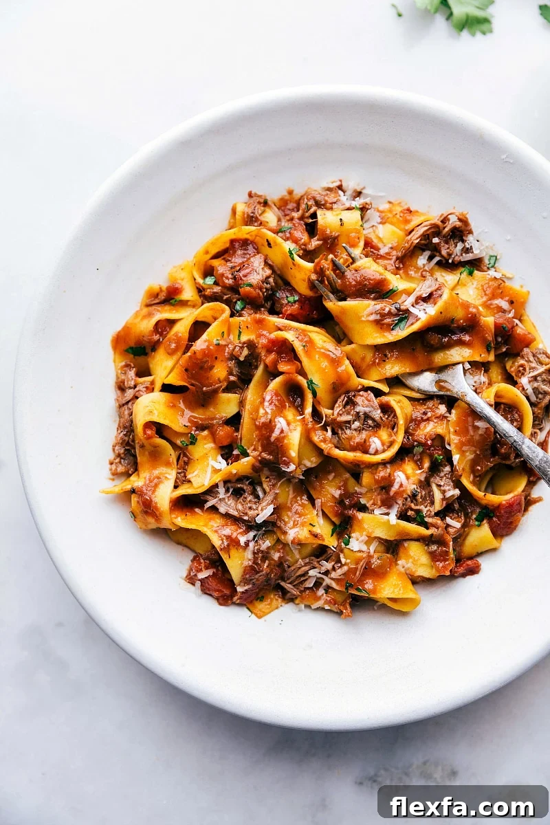 Slow cooker beef ragu with papparelle pasta.