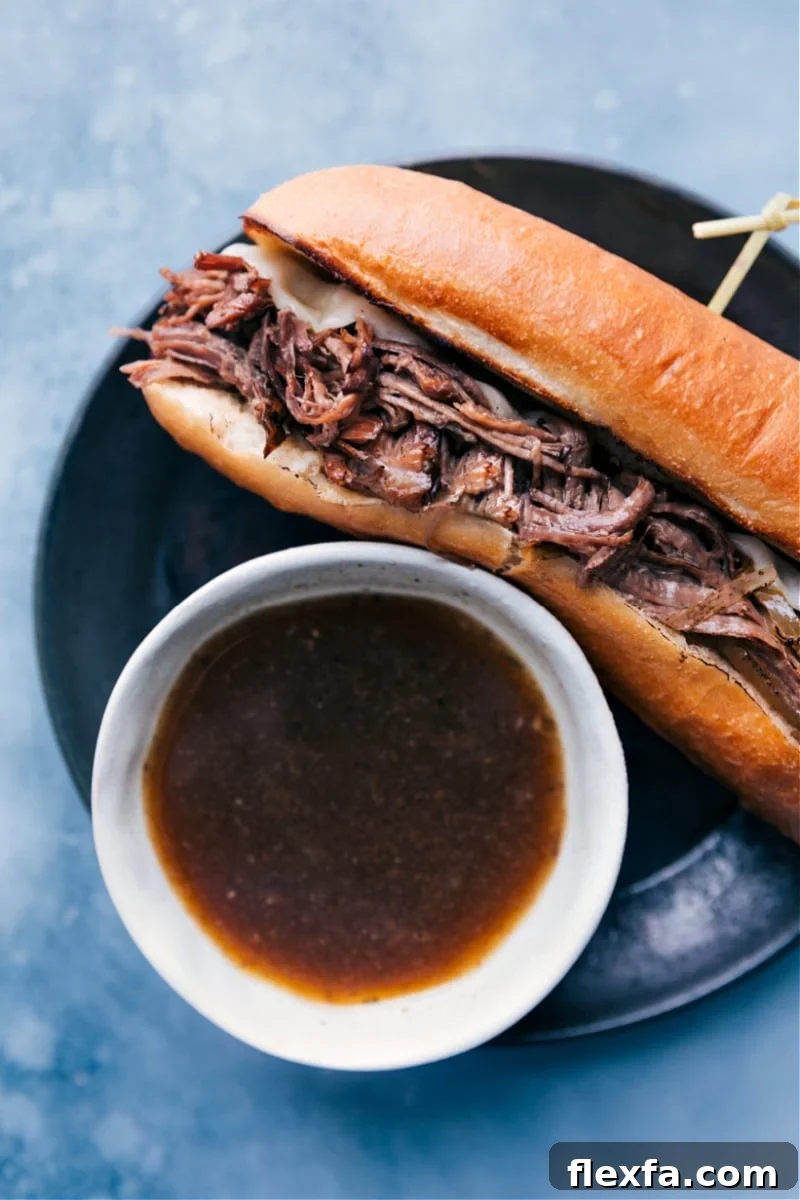 Easy crockpot meal featuring French dip sandwiches with aju sauce on the side.